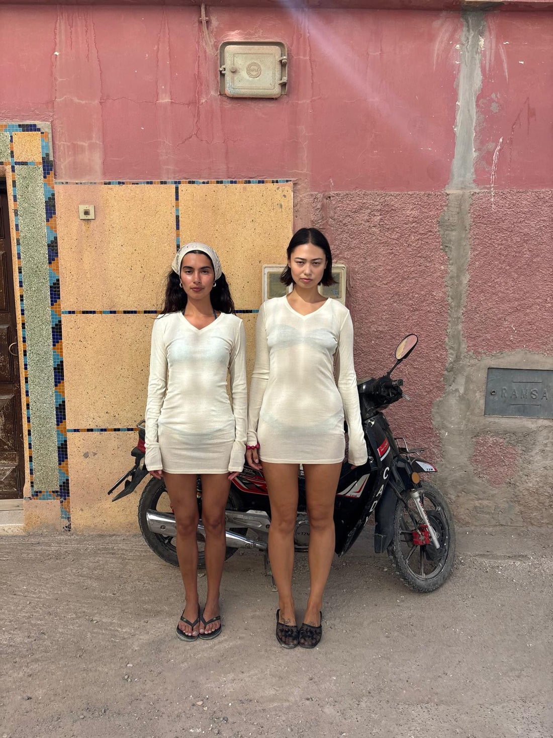 Mia and Sofia in Morocco wearing the Long Sleeve V-Neck Dress