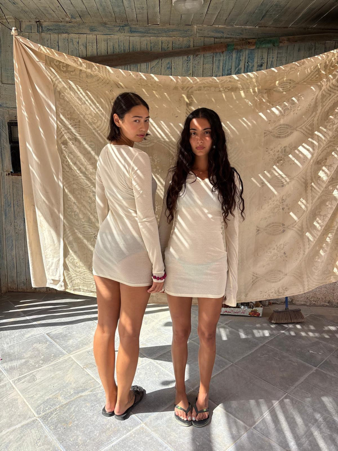 Mia and Sofia in Morocco wearing the Long Sleeve V-Neck Dress